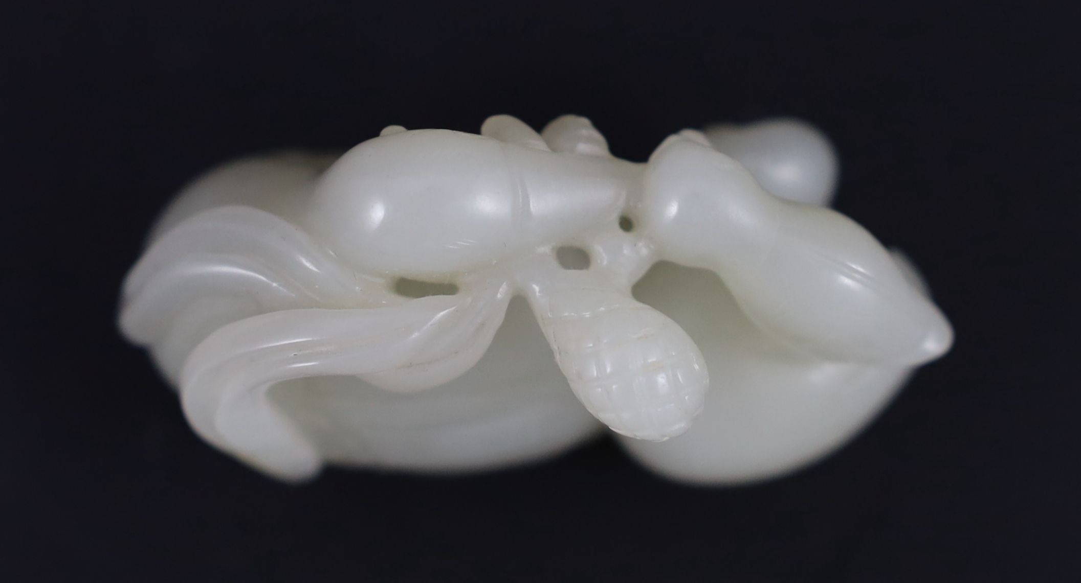 A Chinese pale celadon jade duck group, 5.5 cm long